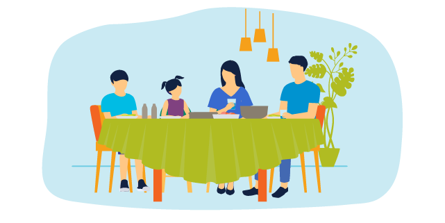 Asian family seated around a table